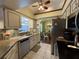 Spacious kitchen featuring granite countertops and stainless steel appliances at 31 Augusta Cir, St Cloud, FL 34769