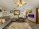 Comfortable living room with fireplace and sectional sofa at 31 Augusta Cir, St Cloud, FL 34769