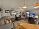 Cozy living room boasting a fireplace and ample seating at 31 Augusta Cir, St Cloud, FL 34769