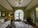 Cozy living room features a large window and comfortable seating at 31 Augusta Cir, St Cloud, FL 34769