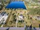 House with a large lot, lake view, and screened pool at 3228 Abalone Blvd, Orlando, FL 32833