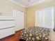 Bedroom with wood floors, a double bed, and a large closet at 3228 Abalone Blvd, Orlando, FL 32833