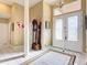 Bright and spacious entryway with elegant double doors and hardwood floors at 3228 Abalone Blvd, Orlando, FL 32833
