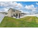 Spacious backyard with patio and grassy area at 332 Pink Ibis Bnd, St Cloud, FL 34772