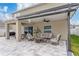 Relaxing covered patio with seating area at 332 Pink Ibis Bnd, St Cloud, FL 34772