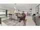 Open concept dining area with kitchen view at 332 Pink Ibis Bnd, St Cloud, FL 34772