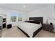 Spacious main bedroom with king-size bed and large windows at 332 Pink Ibis Bnd, St Cloud, FL 34772