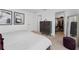 Main bedroom with large bed, walk-in closet, and dresser at 332 Pink Ibis Bnd, St Cloud, FL 34772