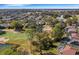 Aerial view of a house and golf course community at 336 Del Sol Ave, Davenport, FL 33837