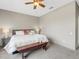 Main bedroom with king-size bed and neutral color palette at 336 Del Sol Ave, Davenport, FL 33837