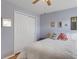 Guest bedroom with a queen bed and spacious closet at 336 Del Sol Ave, Davenport, FL 33837