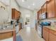 Modern kitchen with stainless steel appliances and granite countertops at 336 Del Sol Ave, Davenport, FL 33837
