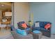 Relaxing screened porch with wicker furniture and view of the backyard at 336 Del Sol Ave, Davenport, FL 33837