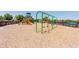 Community playground with swings and playset at 442 Big Black Pl, Poinciana, FL 34759