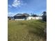 Large backyard with grassy area and shed at 520 Carlsbad Dr, Kissimmee, FL 34758
