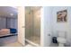 Clean bathroom with a walk-in shower and modern fixtures at 607 Longboat Dr, Davenport, FL 33896