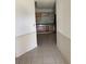 Hallway view that showcases the layout and access to other rooms at 615 Gazelle Dr, Kissimmee, FL 34759