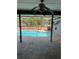 Screened-in pool area with a custom-shaped pool, perfect for relaxing and entertaining at 615 Gazelle Dr, Kissimmee, FL 34759