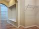Spacious walk-in closet featuring built in shelving and window bench seat at 6826 Goldflower Ave, Harmony, FL 34773