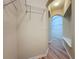 Spacious walk-in closet featuring built in shelving at 6826 Goldflower Ave, Harmony, FL 34773
