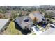 Beautiful two-story home showcasing lush landscaping, an attached garage, and a tranquil backyard oasis at 6826 Goldflower Ave, Harmony, FL 34773