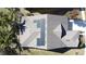Aerial view of a roof featuring solar panels at 6826 Goldflower Ave, Harmony, FL 34773