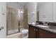 Bathroom with shower, toilet and granite vanity at 7617 Wilmington Loop, Kissimmee, FL 34747