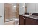 Bathroom with shower, toilet and granite vanity at 7617 Wilmington Loop, Kissimmee, FL 34747