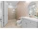 Bathroom with shower, toilet and vanity at 7617 Wilmington Loop, Kissimmee, FL 34747