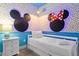Small bedroom with twin bed and Mickey Mouse decor at 7617 Wilmington Loop, Kissimmee, FL 34747
