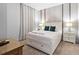 Bedroom with a queen-size bed and en-suite bathroom at 7617 Wilmington Loop, Kissimmee, FL 34747