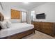 Bedroom with a king-size bed and en-suite bathroom at 7617 Wilmington Loop, Kissimmee, FL 34747