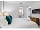 Bedroom with a king-size bed and en-suite bathroom at 7617 Wilmington Loop, Kissimmee, FL 34747