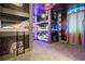 A bunk bed room with a superhero theme and LED lighting at 7617 Wilmington Loop, Kissimmee, FL 34747