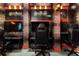 Basement game room with Harry Potter theme, multiple gaming stations, pool table, and air hockey at 7617 Wilmington Loop, Kissimmee, FL 34747