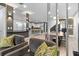 Open living space with a view into kitchen and dining area at 7617 Wilmington Loop, Kissimmee, FL 34747