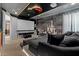 Home theater with sectional sofa and large screen at 7617 Wilmington Loop, Kissimmee, FL 34747