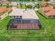 Aerial view of house and large backyard patio at 870 Spinnaker Way, Kissimmee, FL 34746