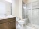 Modern bathroom with a large walk-in shower and updated vanity at 870 Spinnaker Way, Kissimmee, FL 34746