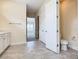 Main bathroom with toilet and access to bedroom at 870 Spinnaker Way, Kissimmee, FL 34746