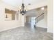 Open dining room with view into living room and staircase at 870 Spinnaker Way, Kissimmee, FL 34746