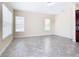 Spacious dining area with tile floors and natural light from large windows at 870 Spinnaker Way, Kissimmee, FL 34746