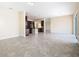 Open concept kitchen and dining area with dark wood cabinets and tile floors at 870 Spinnaker Way, Kissimmee, FL 34746