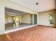 Covered patio with sliding glass doors leading to the living area at 870 Spinnaker Way, Kissimmee, FL 34746