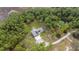 Home nestled in a wooded area at 875 Eden Dr, St Cloud, FL 34771