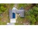 Top-down view of house, pool, and yard at 875 Eden Dr, St Cloud, FL 34771