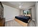 Large bedroom with light wood platform bed at 875 Eden Dr, St Cloud, FL 34771