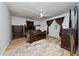 Main bedroom with plush carpeting, large windows, and walk-in closet at 875 Eden Dr, St Cloud, FL 34771