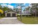 Ranch home with attached garage and expansive yard at 875 Eden Dr, St Cloud, FL 34771