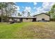 House with attached workshop and above ground pool at 875 Eden Dr, St Cloud, FL 34771